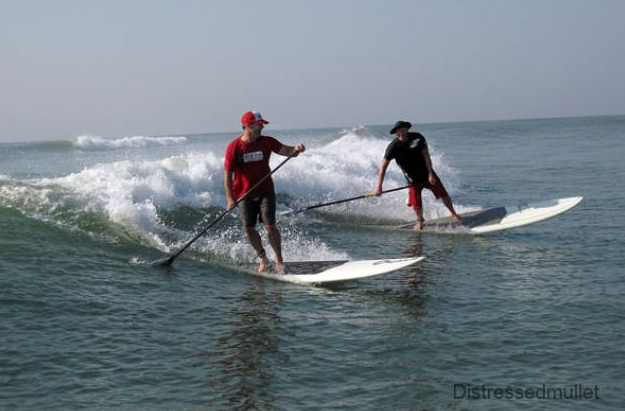 Subboarding Stand up paddle surfing and stand up paddle boarding (SUP ...